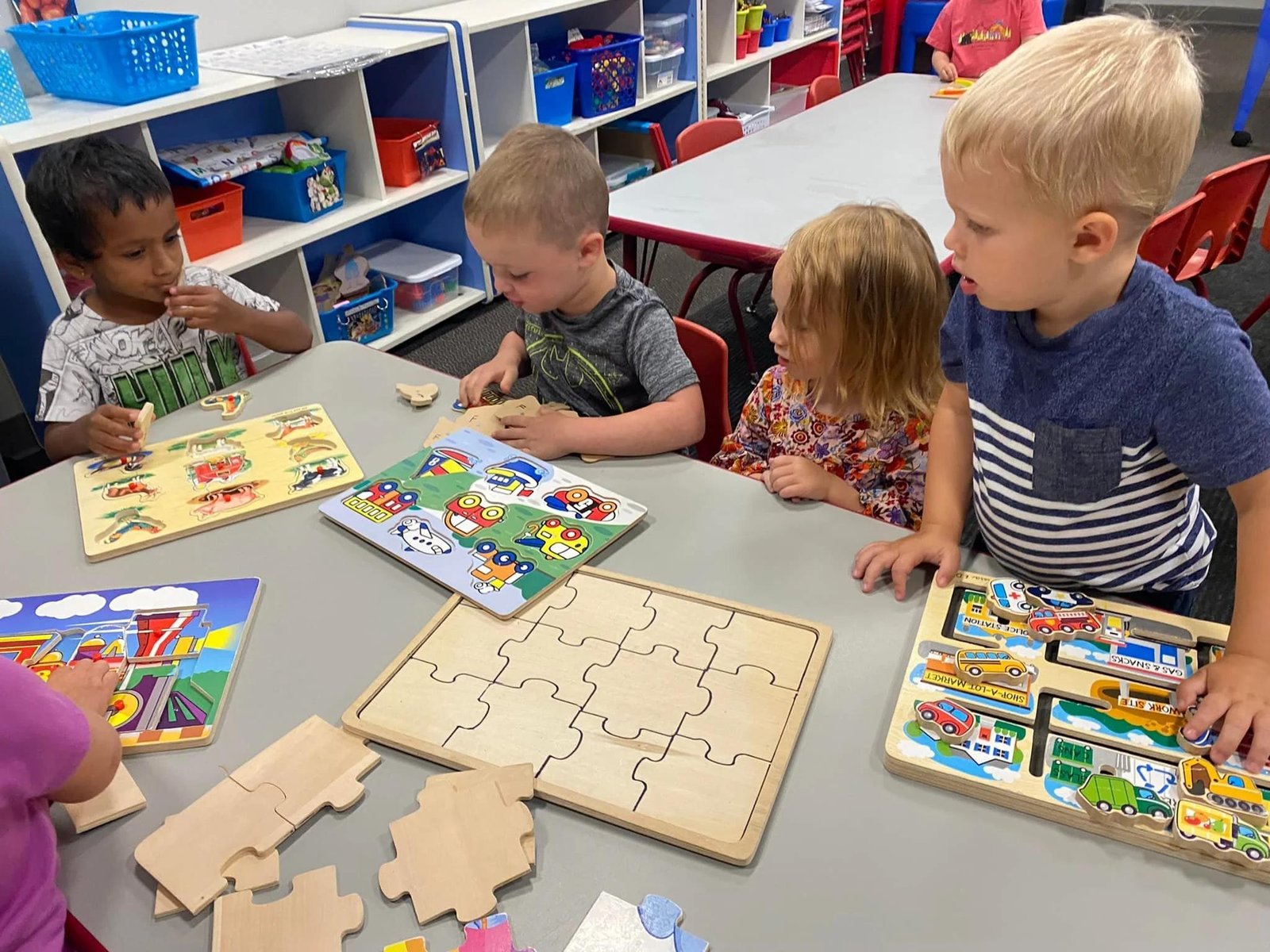 Children solving puzzles and playing thinking games
