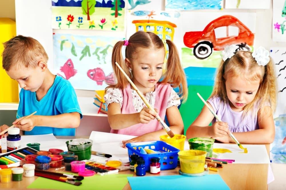 Child enjoying painting and creative activities